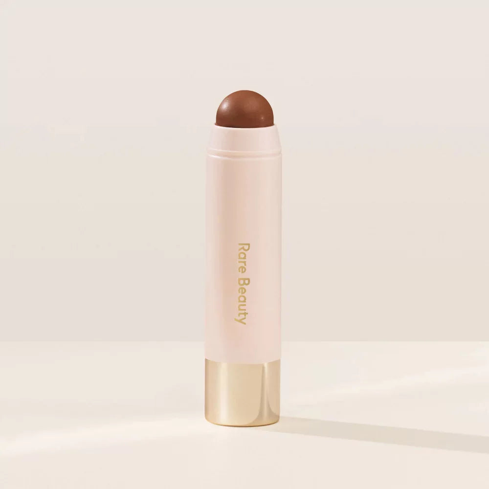 Rare Beauty من سيلينا جوميز – كريم التسمير Warm Wishes Effortless Cream Bronzer Stick للحصول على توهج مشمس®